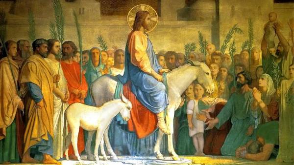 Domingo de Ramos - Jesus em cima do burrinho chega a cidade de Jerusalém